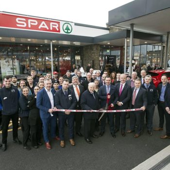 Eugene Dalton, senior and founder of Corrib Oil cuts the tape at the opening of SPAR Corrib Oil in Tralee