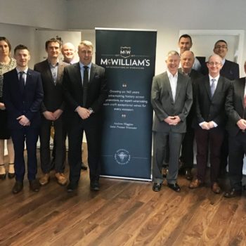 Representatives from Ampersand and the McWilliam's wine group mark the companies' new partnership