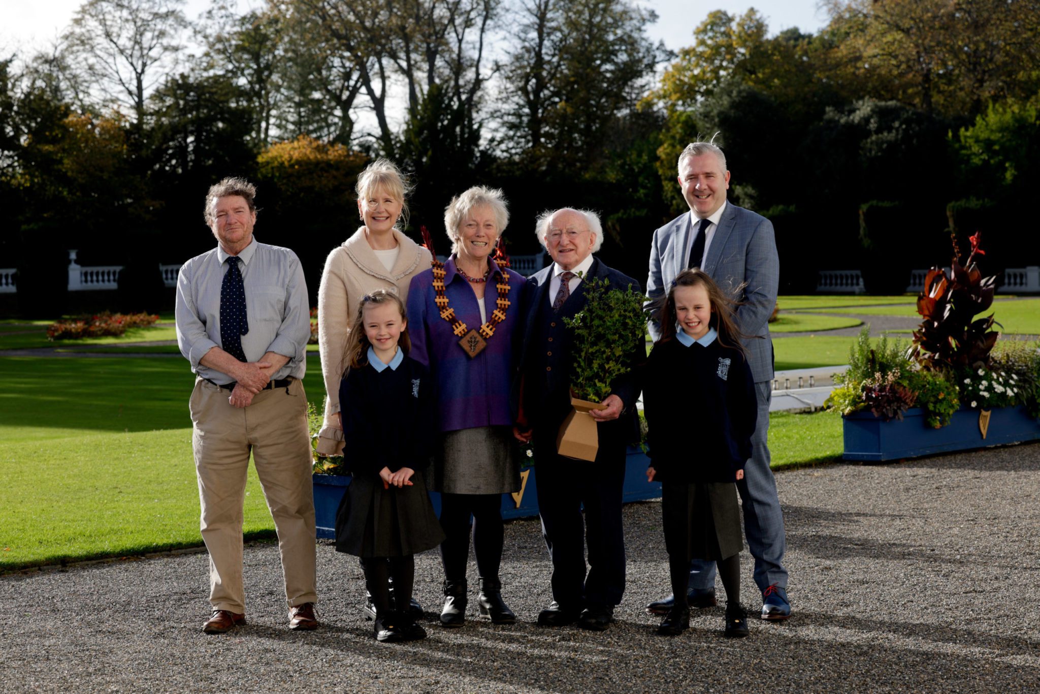 President Higgins plants holly tree to celebrate Spar National Tree Day